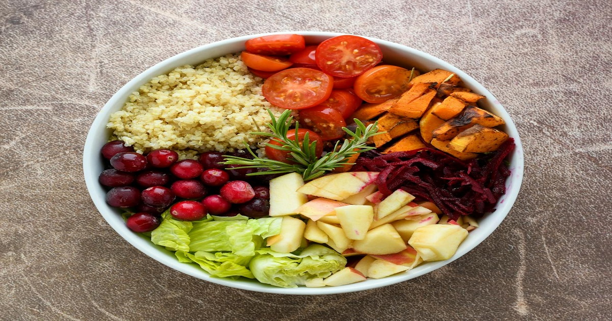 Balanced bowl with fruits, vegetables, whole grains, and plant foods representing everyday healthy eating