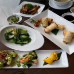 Balanced everyday meal with grains, vegetables, and protein served together on a dining table